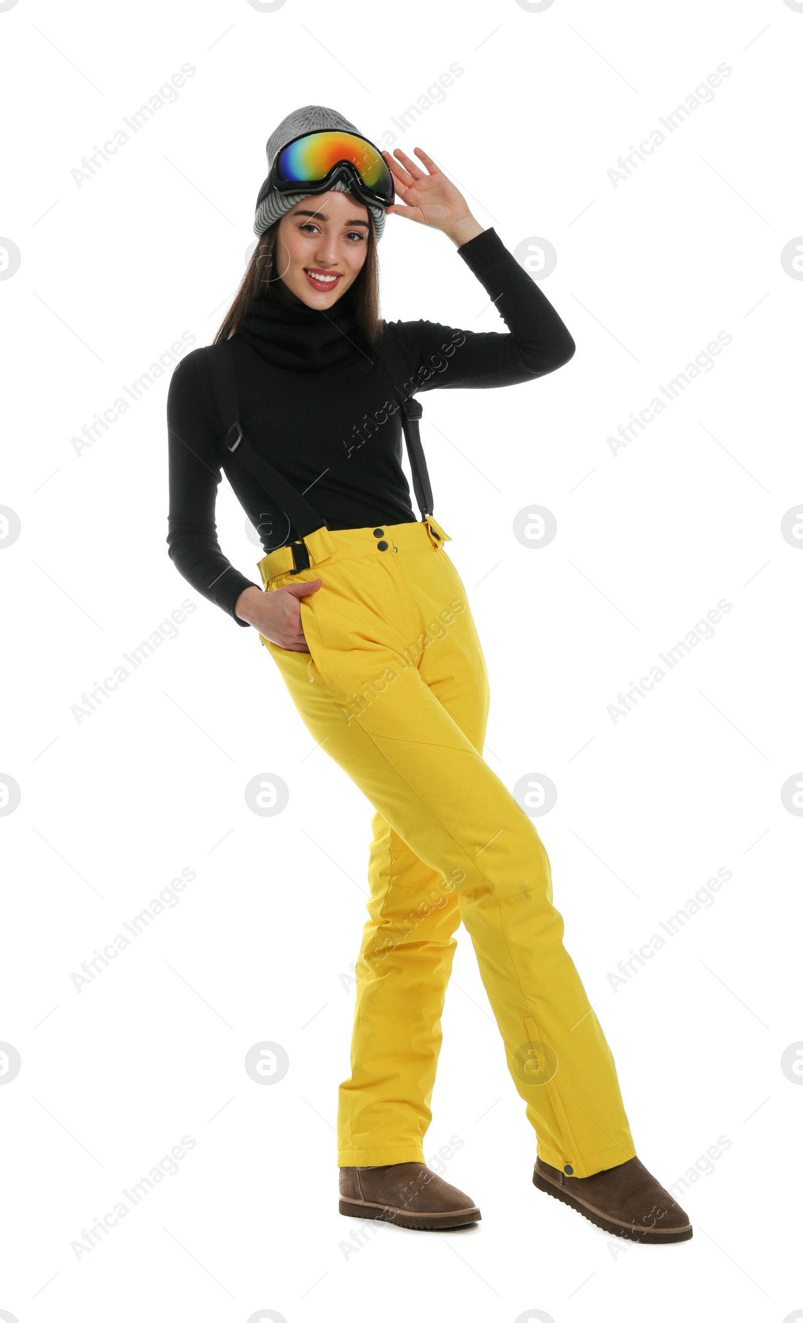 Photo of Woman wearing stylish winter sport clothes on white background