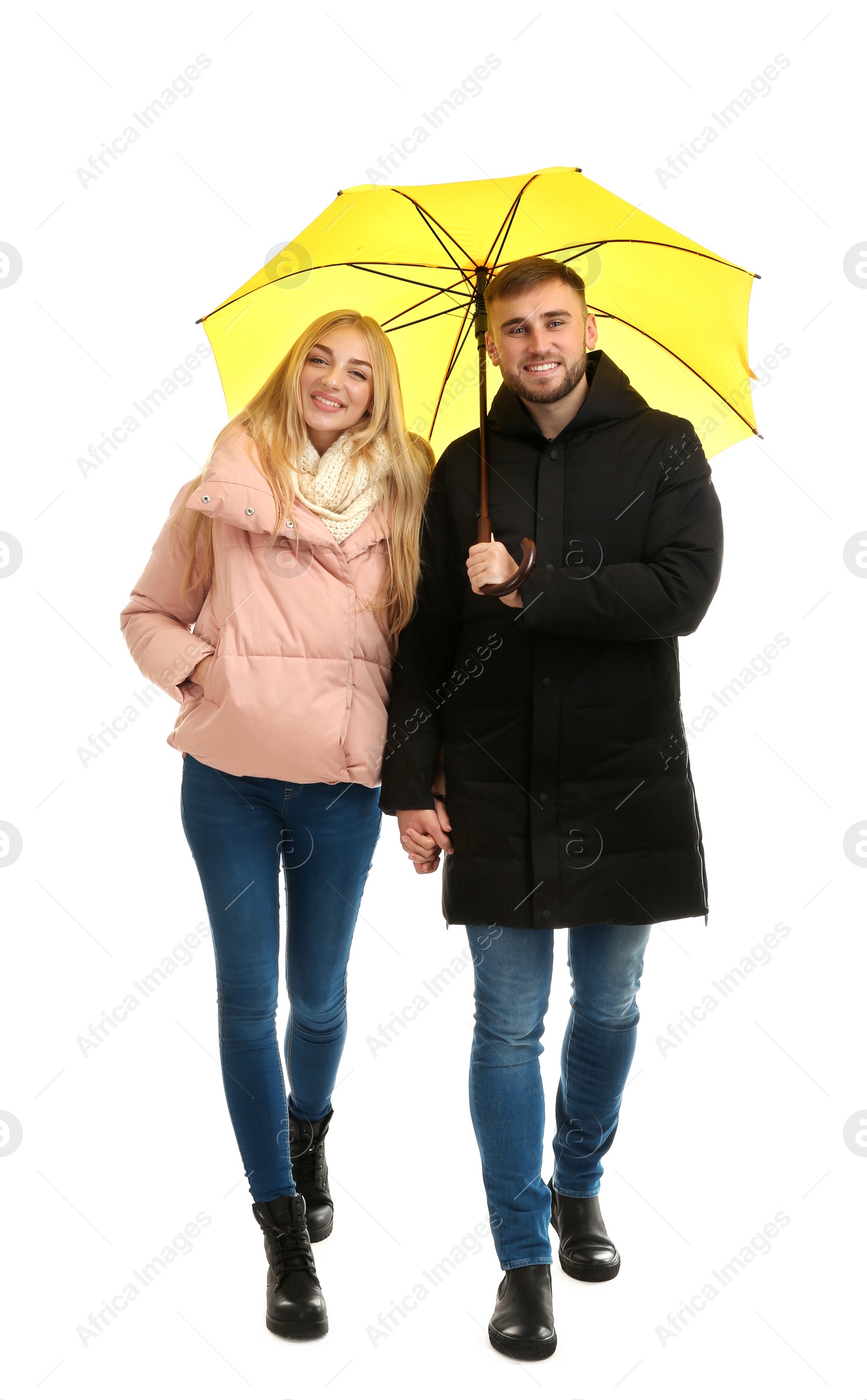 Photo of Full length portrait of beautiful couple with umbrella, isolated on white