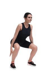 Photo of Woman doing squats on white background. Morning exercise