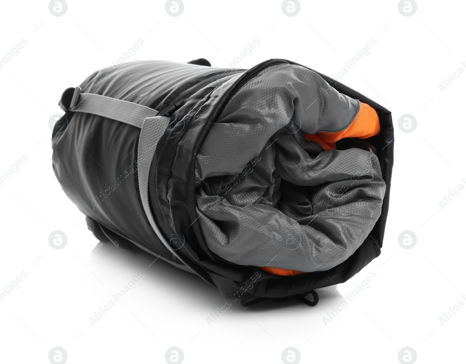 Photo of Sleeping bag in case on white background. Camping equipment