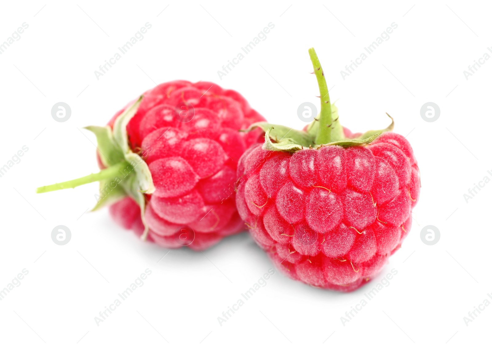 Photo of Delicious fresh ripe raspberries isolated on white