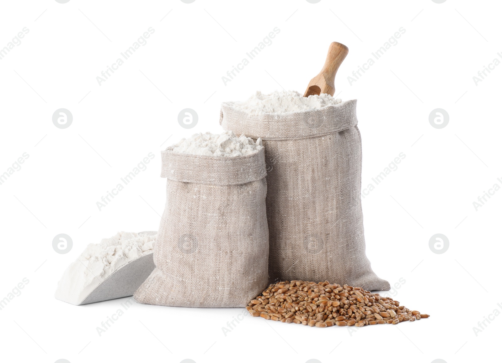 Photo of Sacks with flour and grains on white background