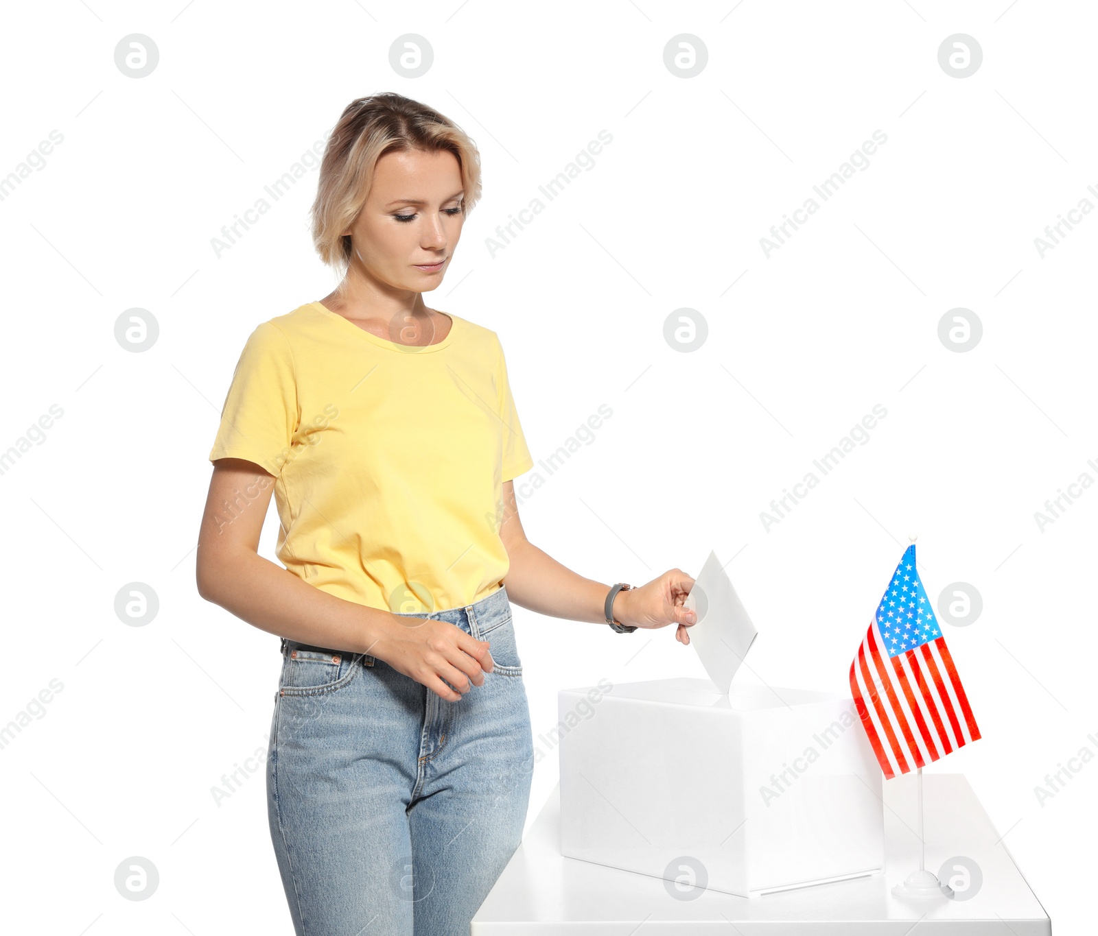 Photo of Woman putting ballot paper into box against white background