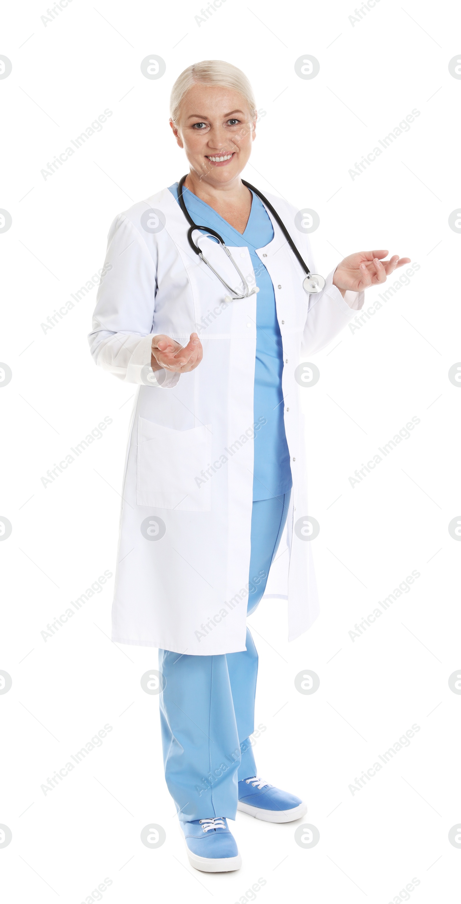 Photo of Full length portrait of female doctor isolated on white. Medical staff