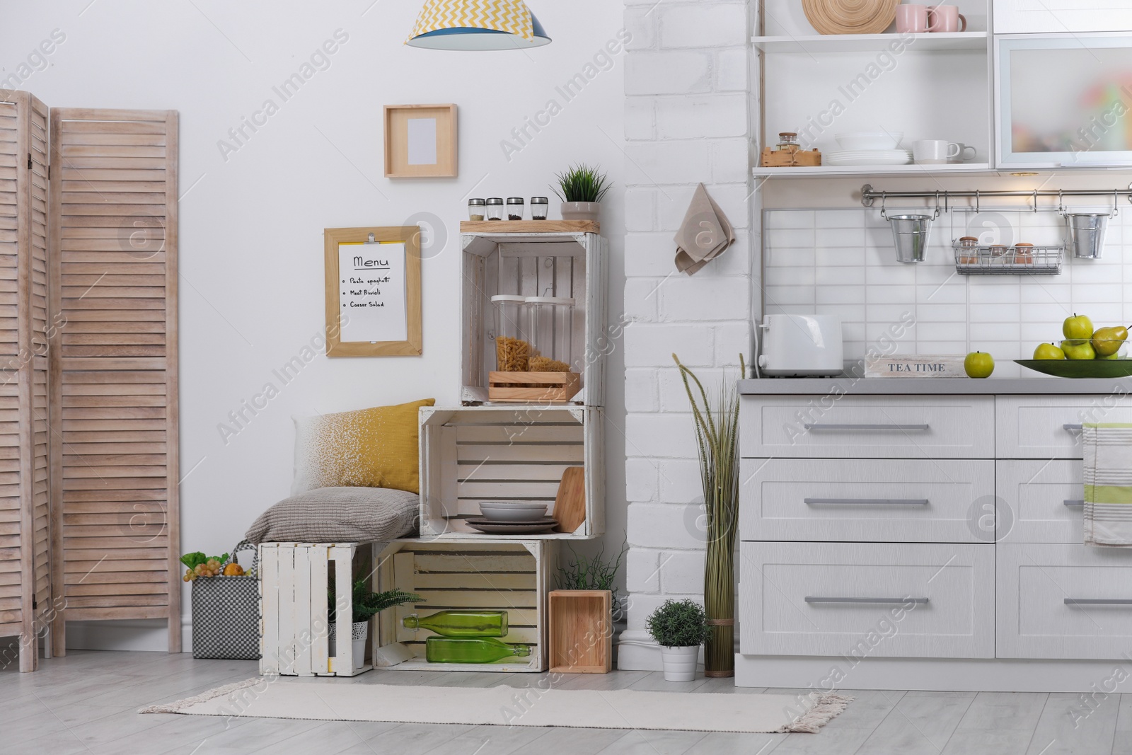 Photo of Modern kitchen interior with wooden crates as eco furniture