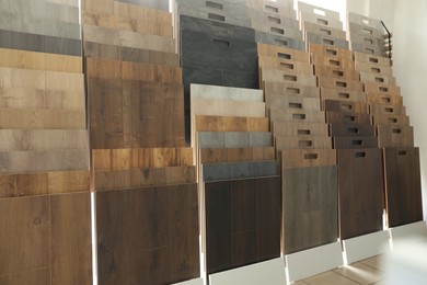 Photo of Many different samples of tiles on display in store