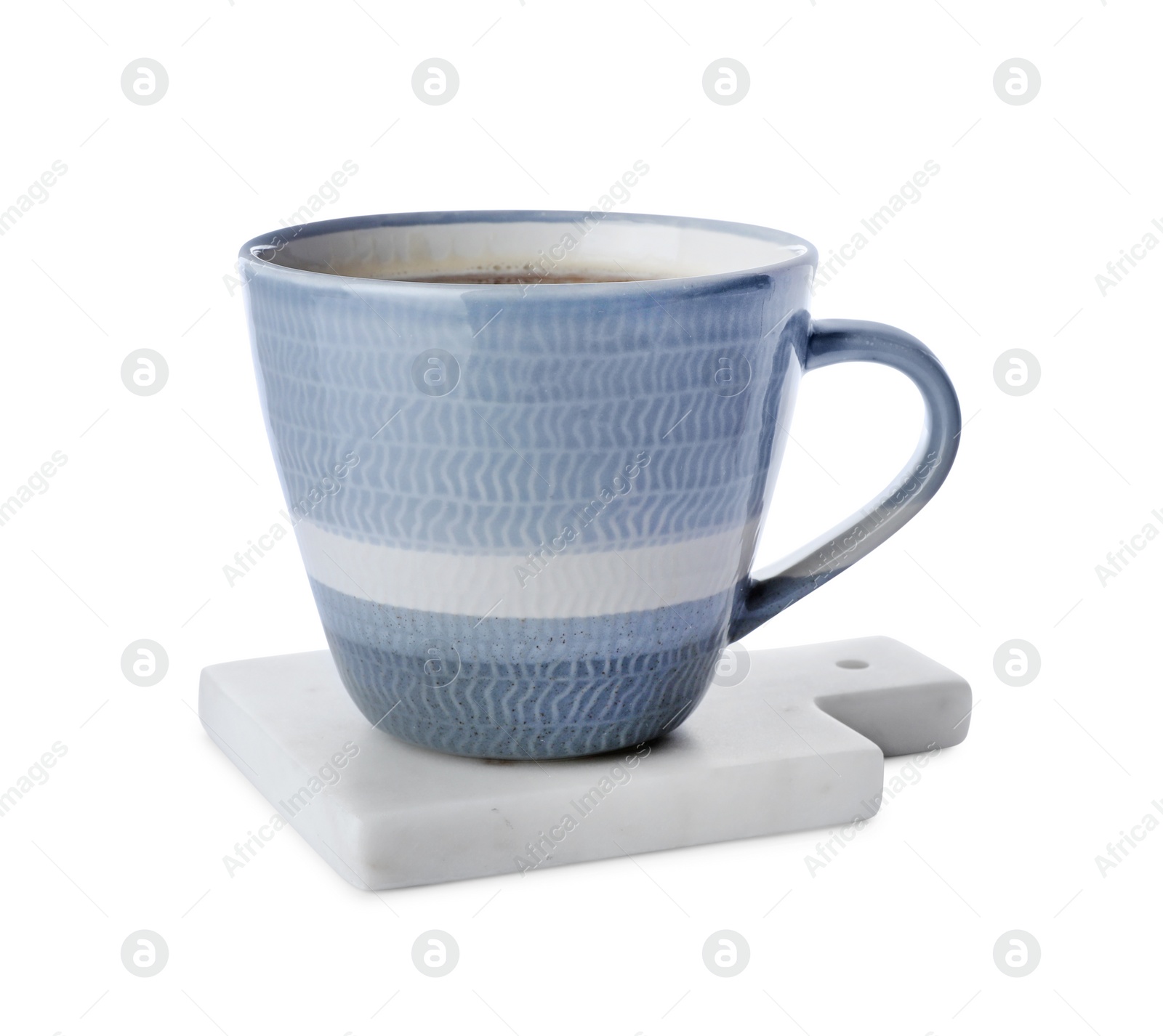 Photo of Mug of coffee and stylish stone cup coaster isolated on white