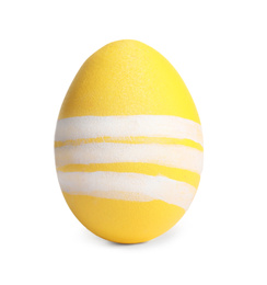 Photo of Yellow egg with stripes isolated on white. Easter symbol