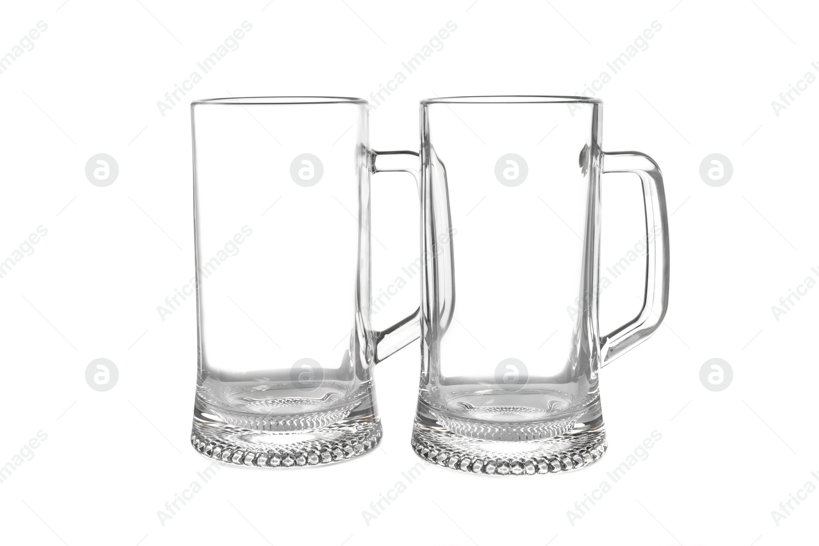 Photo of Elegant clean empty beer glasses isolated on white