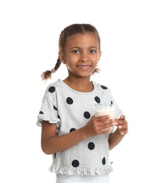 Photo of Adorable African-American girl with glass of milk on white background