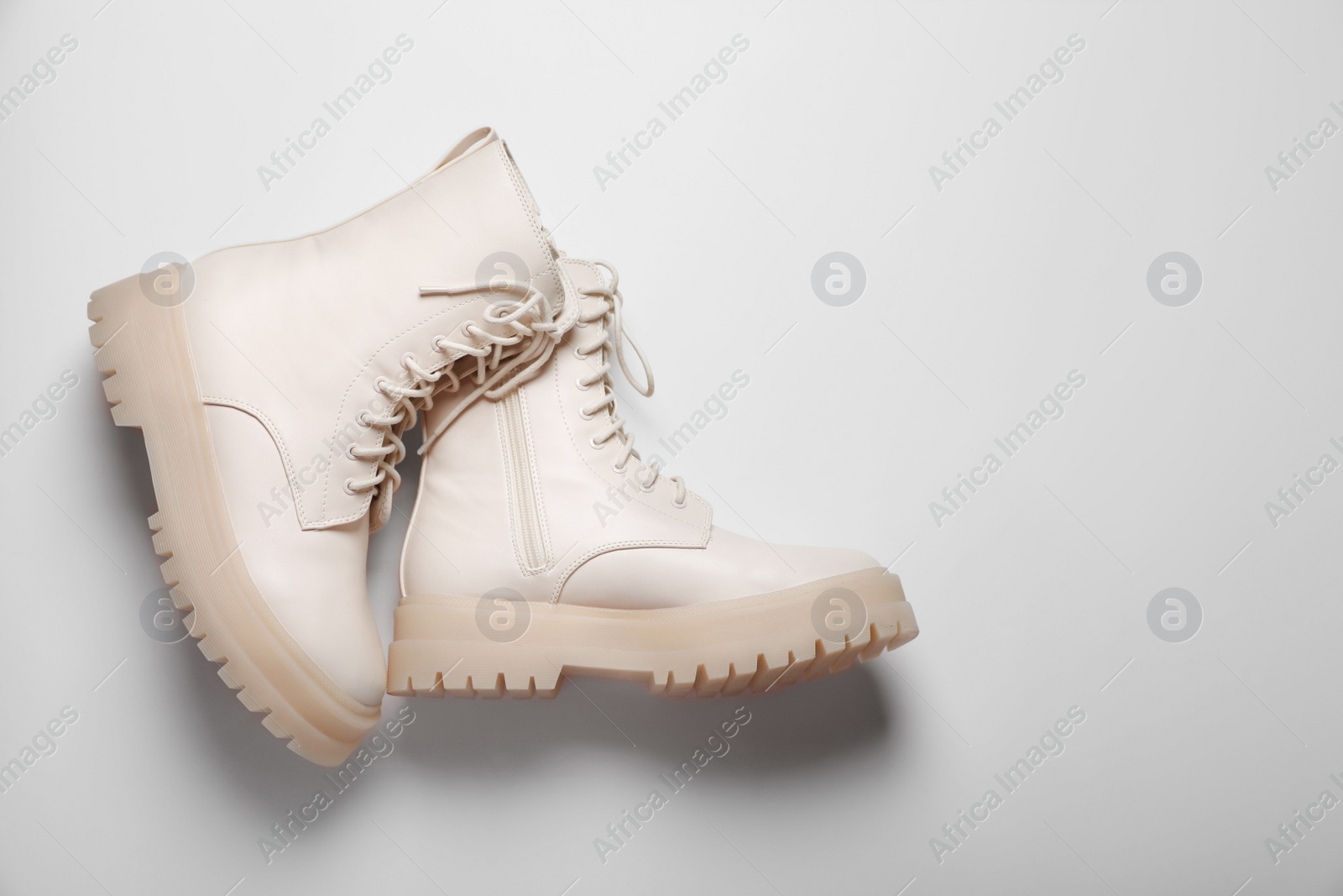 Photo of Pair of stylish leather shoes on white background, flat lay. Space for text