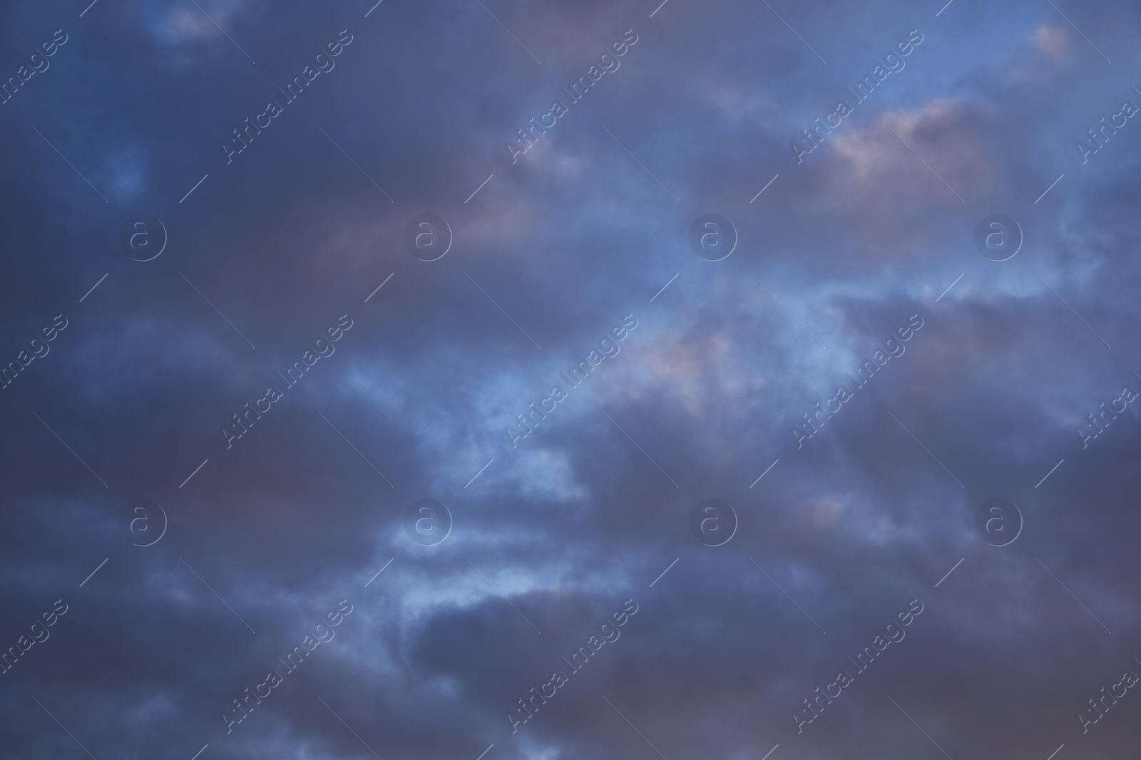 Photo of Beautiful blue sky with many dark clouds. Stormy weather