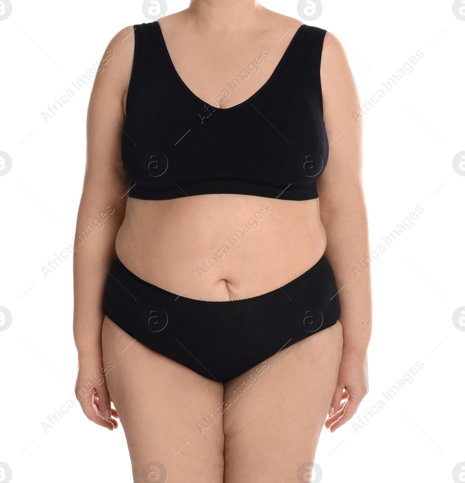 Photo of Overweight woman in underwear on white background, closeup