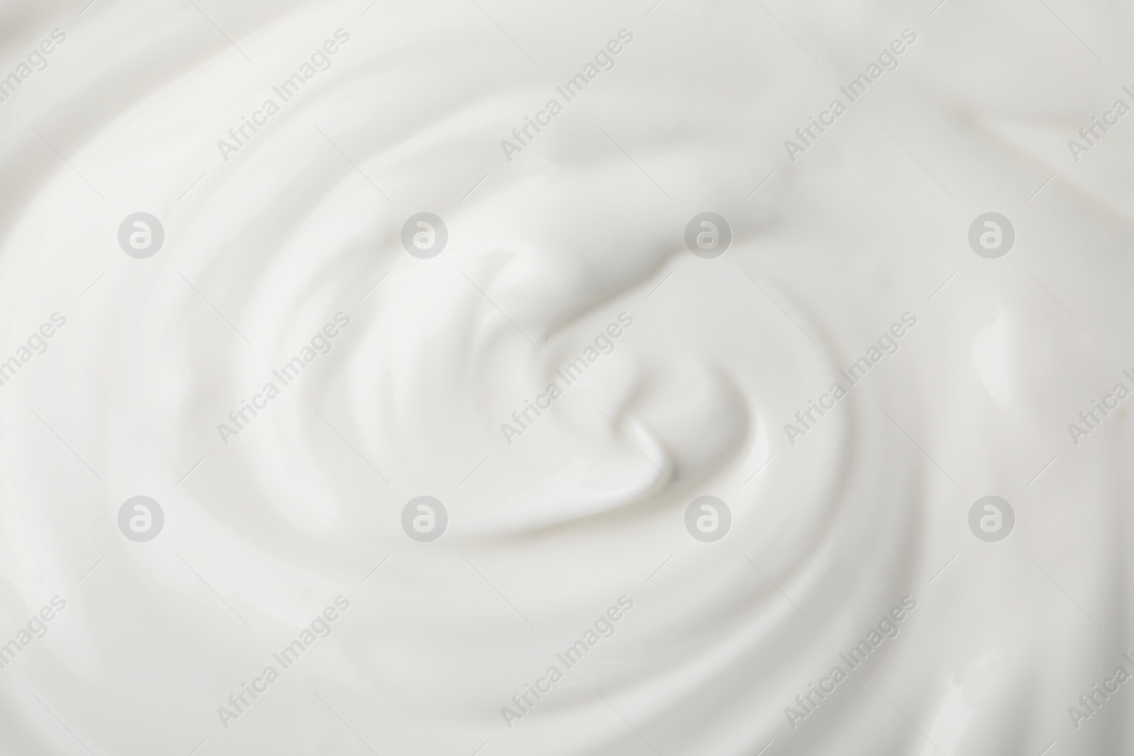 Photo of Delicious natural yogurt as background, top view