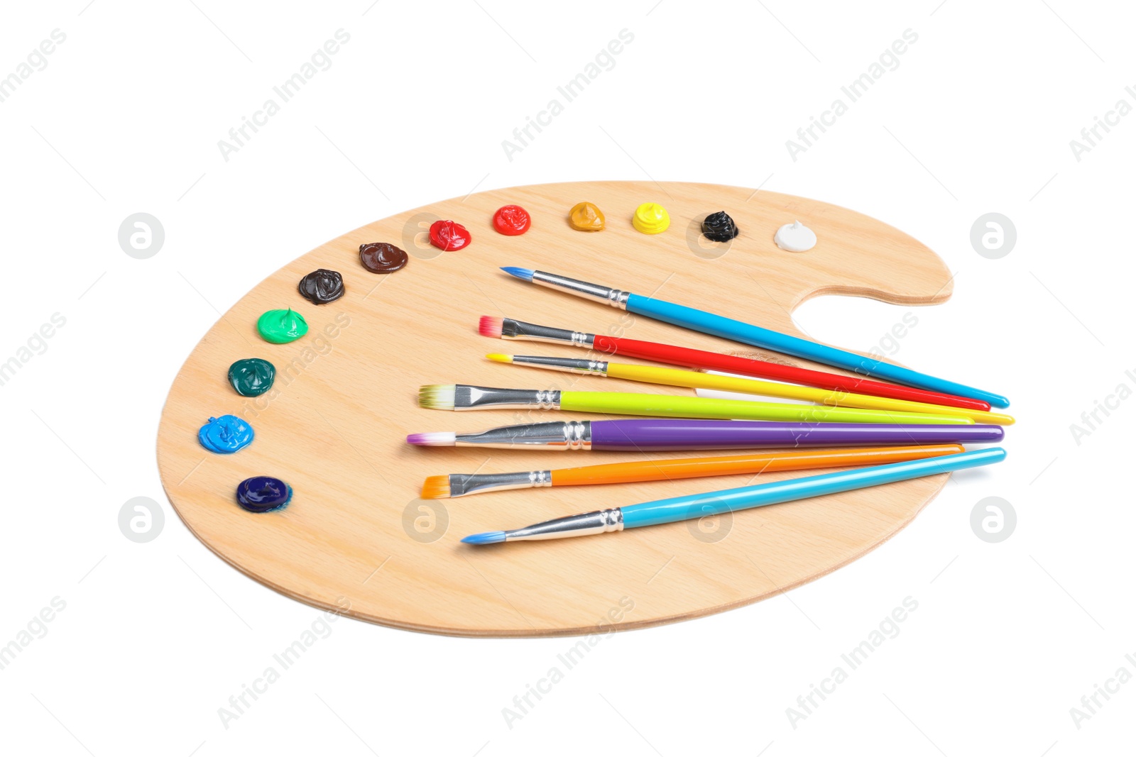 Photo of Palette with paints and brushes on white background. Artist equipment