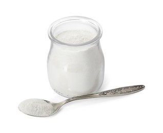 Baking powder in glass jar and spoon isolated on white