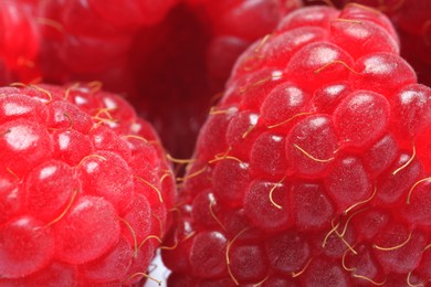 Tasty fresh ripe raspberries as background, macro view. Fresh berries