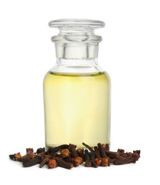 Photo of Essential oil and dried cloves on white background