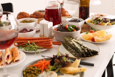 Many different dishes served on buffet table for brunch