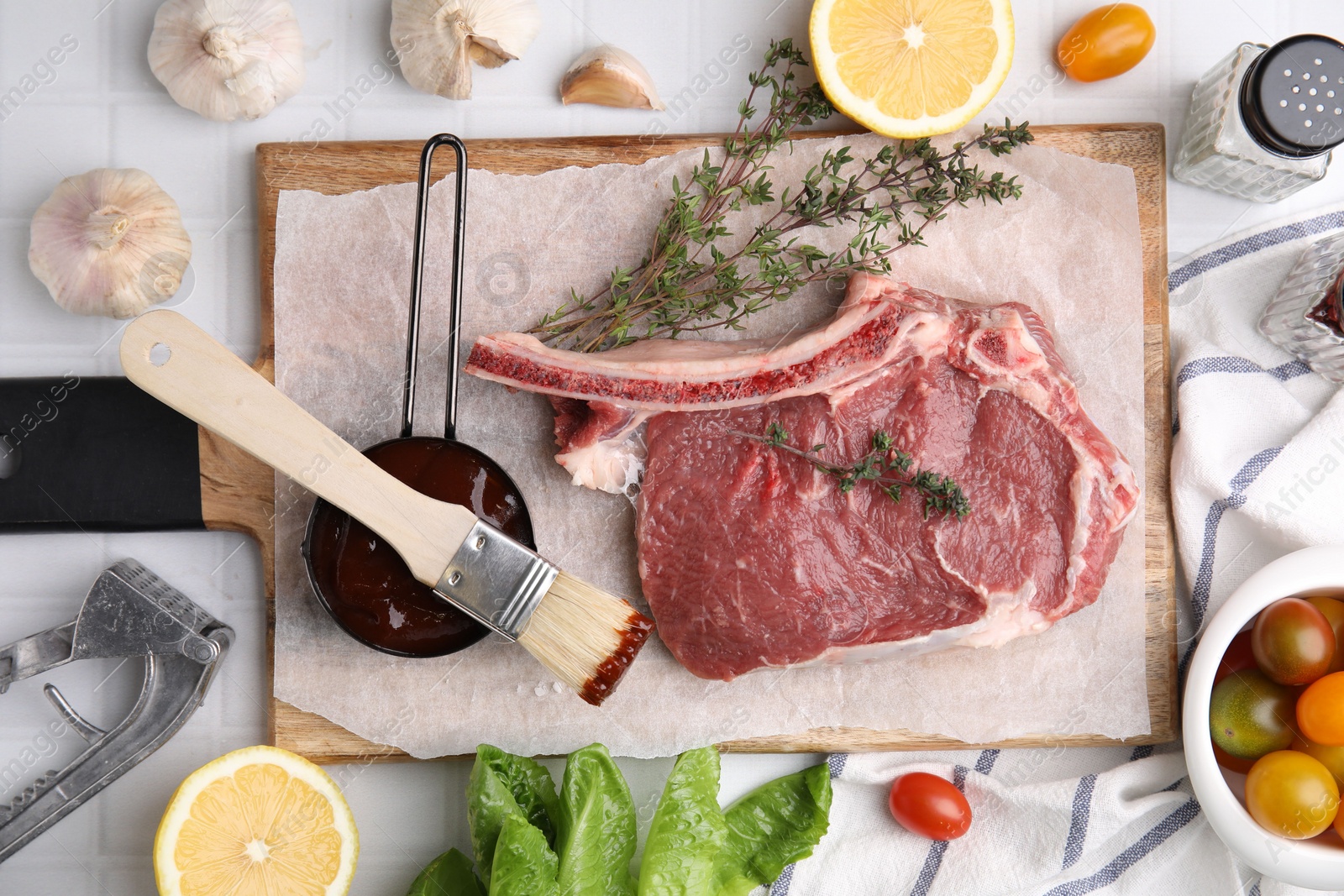 Photo of Flat lay composition with raw meat, thyme and marinade on white tiled table