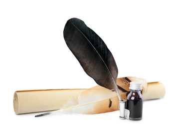 Photo of Feather pens, bottle of ink and parchment scroll on white background