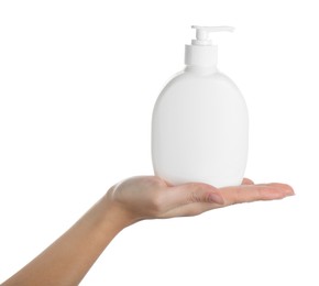Photo of Woman holding liquid soap dispenser on white background, closeup