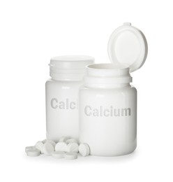 Image of Calcium supplement. Bottles with pills on white background