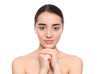 Portrait of young woman with beautiful face against white background