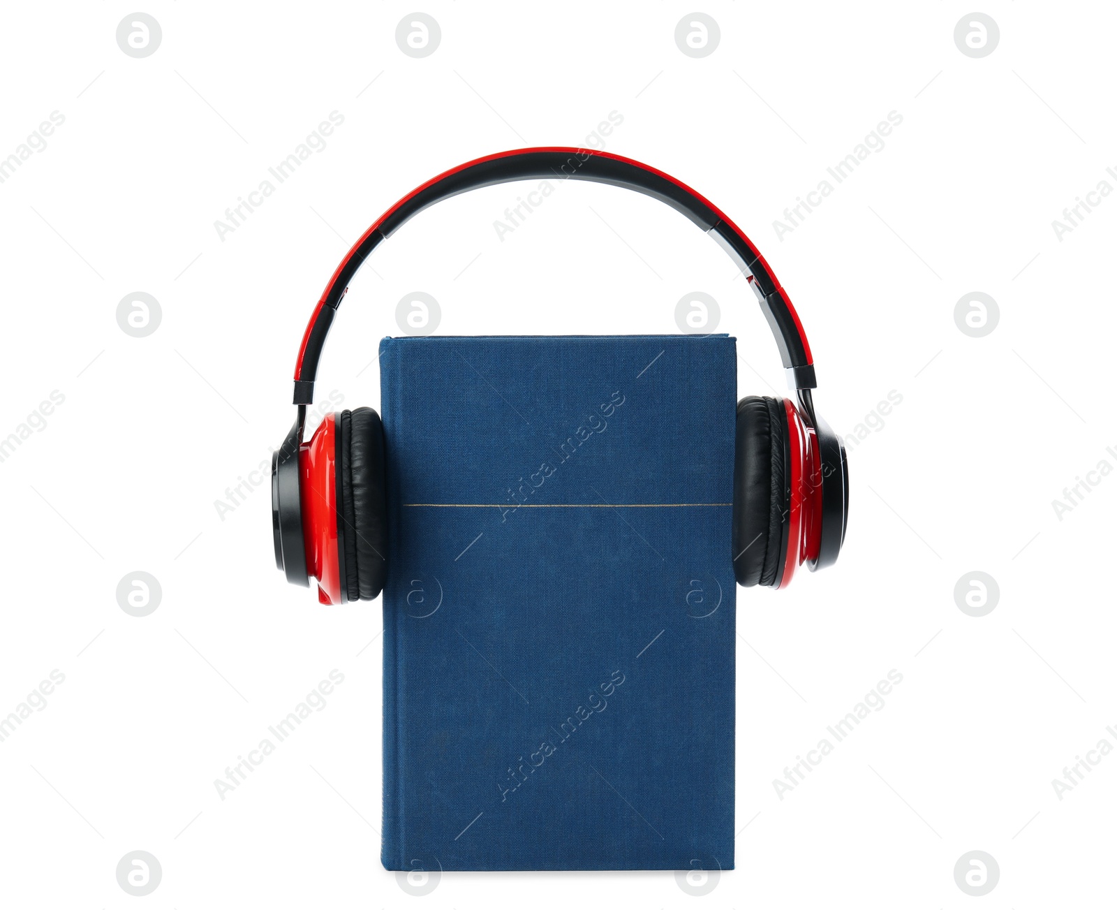 Photo of Book and modern headphones isolated on white