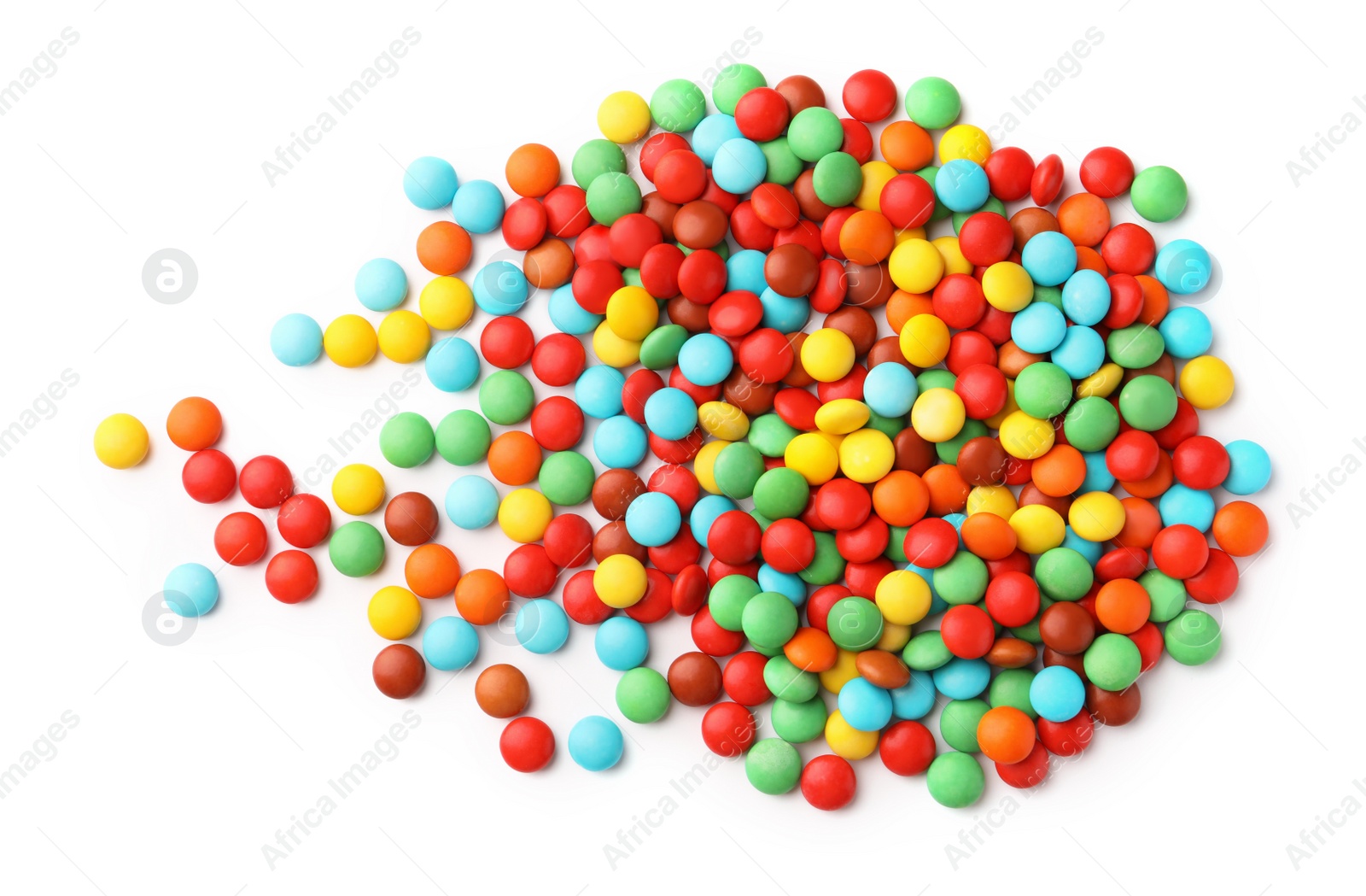 Photo of Many small colorful candies on white background, top view