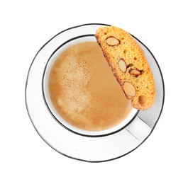 Photo of Tasty cantucci and cup of aromatic coffee on white background, top view. Traditional Italian almond biscuits