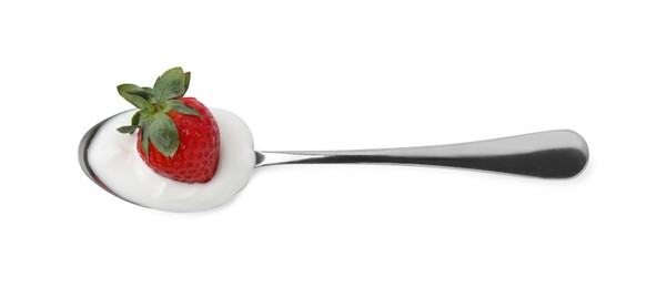 Photo of Spoon with yogurt and strawberry isolated on white, top view