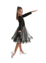 Photo of Beautifully dressed little girl dancing on white background