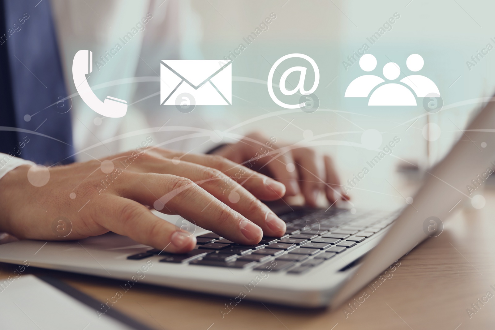 Image of Hotline service. Man working on laptop at table, closeup