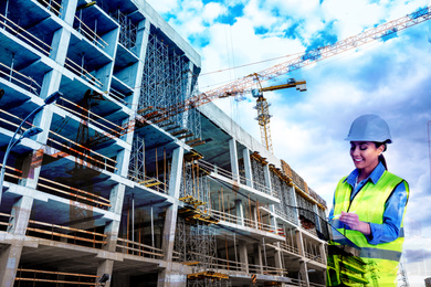 Double exposure of professional engineer in safety equipment and construction site