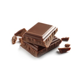 Photo of Pieces of tasty milk chocolate on white background