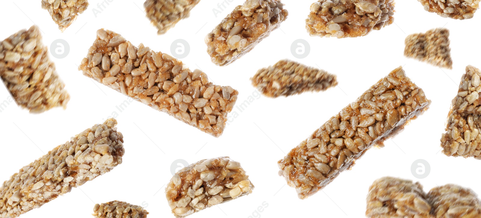 Image of Tasty sweet kozinaki falling on white background, banner design