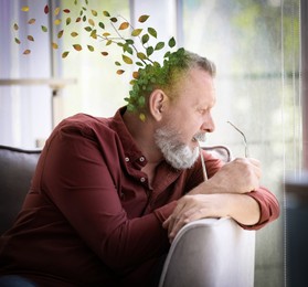Image of Senior man suffering from dementia at home. Illustration of brain as plant losing leaves