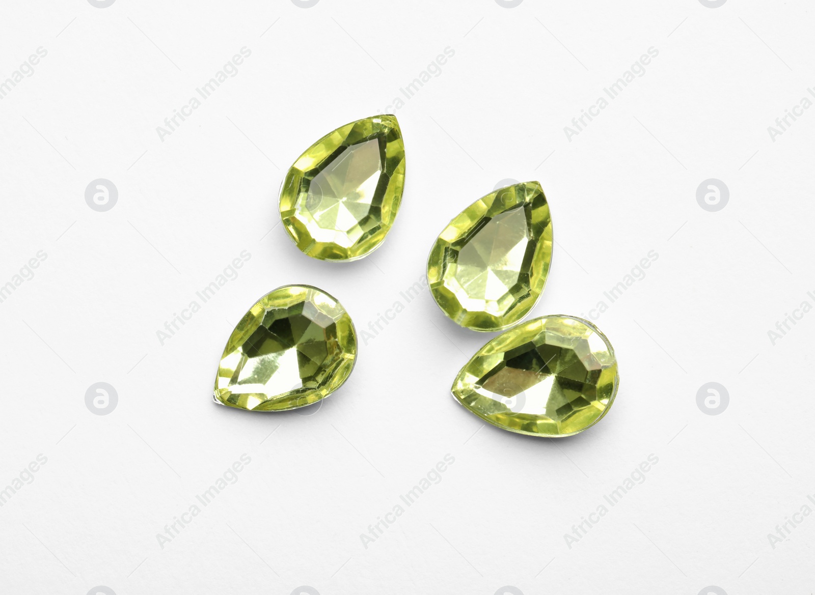 Image of Beautiful gemstones on white background, top view