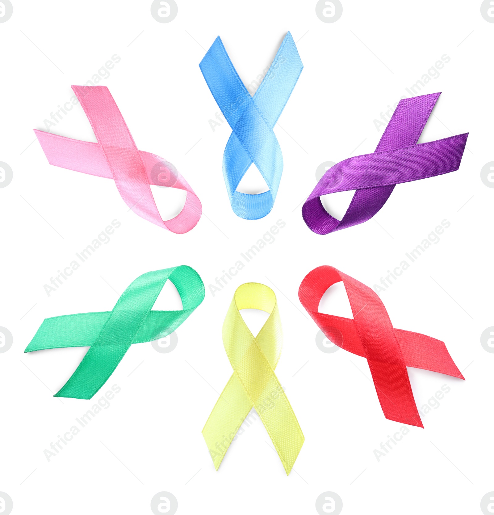 Image of Collection of different color ribbons on white background, top view. World Cancer Day