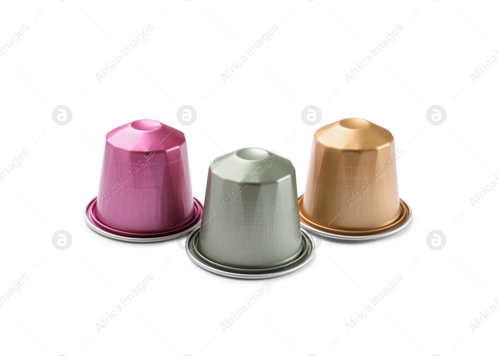 Photo of Three plastic coffee capsules isolated on white