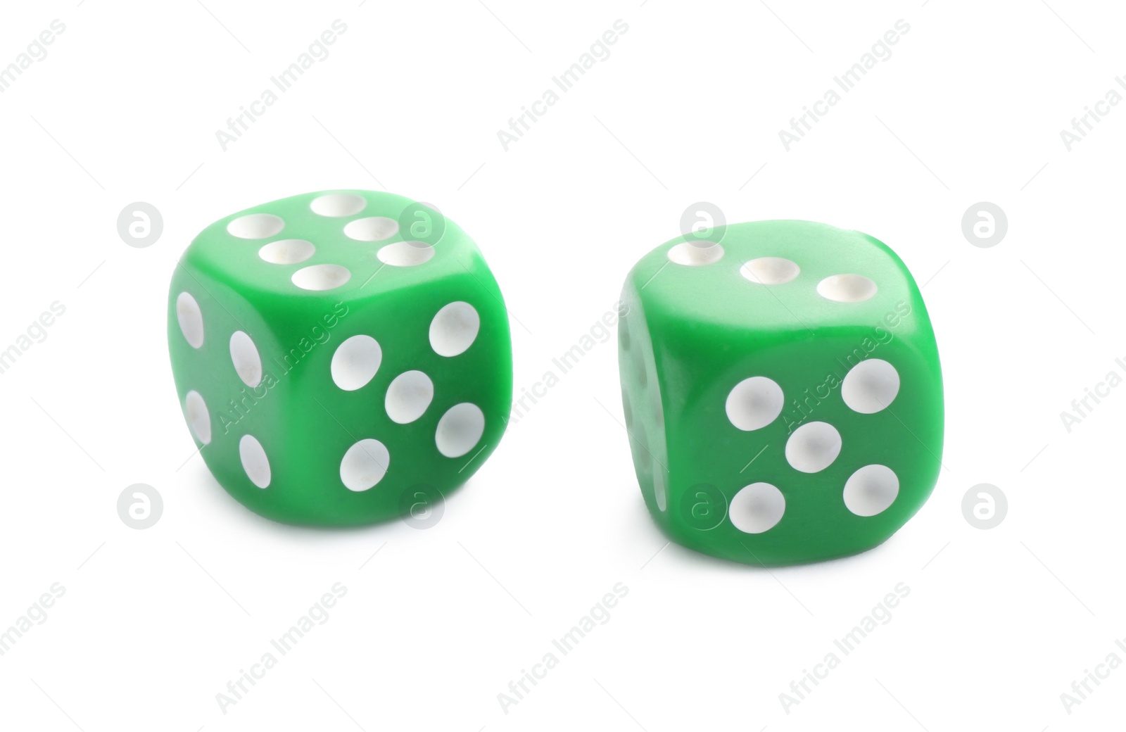 Photo of Two green game dices isolated on white