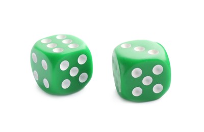 Two green game dices isolated on white