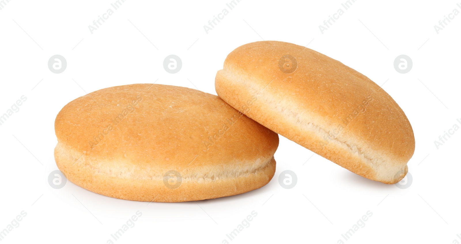 Photo of Two fresh burger buns isolated on white