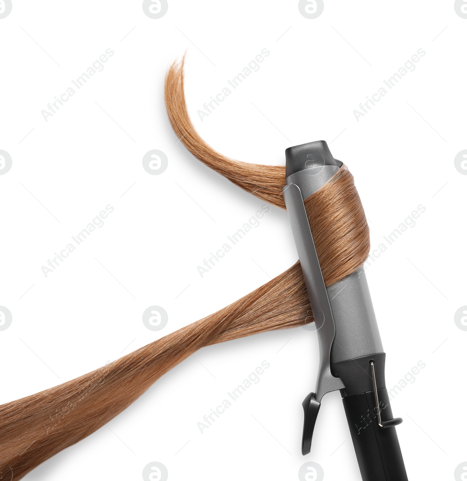 Photo of Curling iron with hair lock on white background, top view