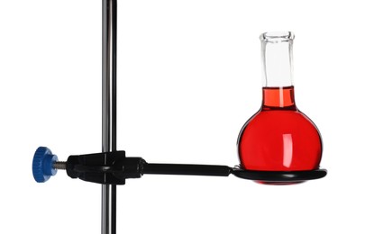 Photo of Retort stand with flask of red liquid isolated on white