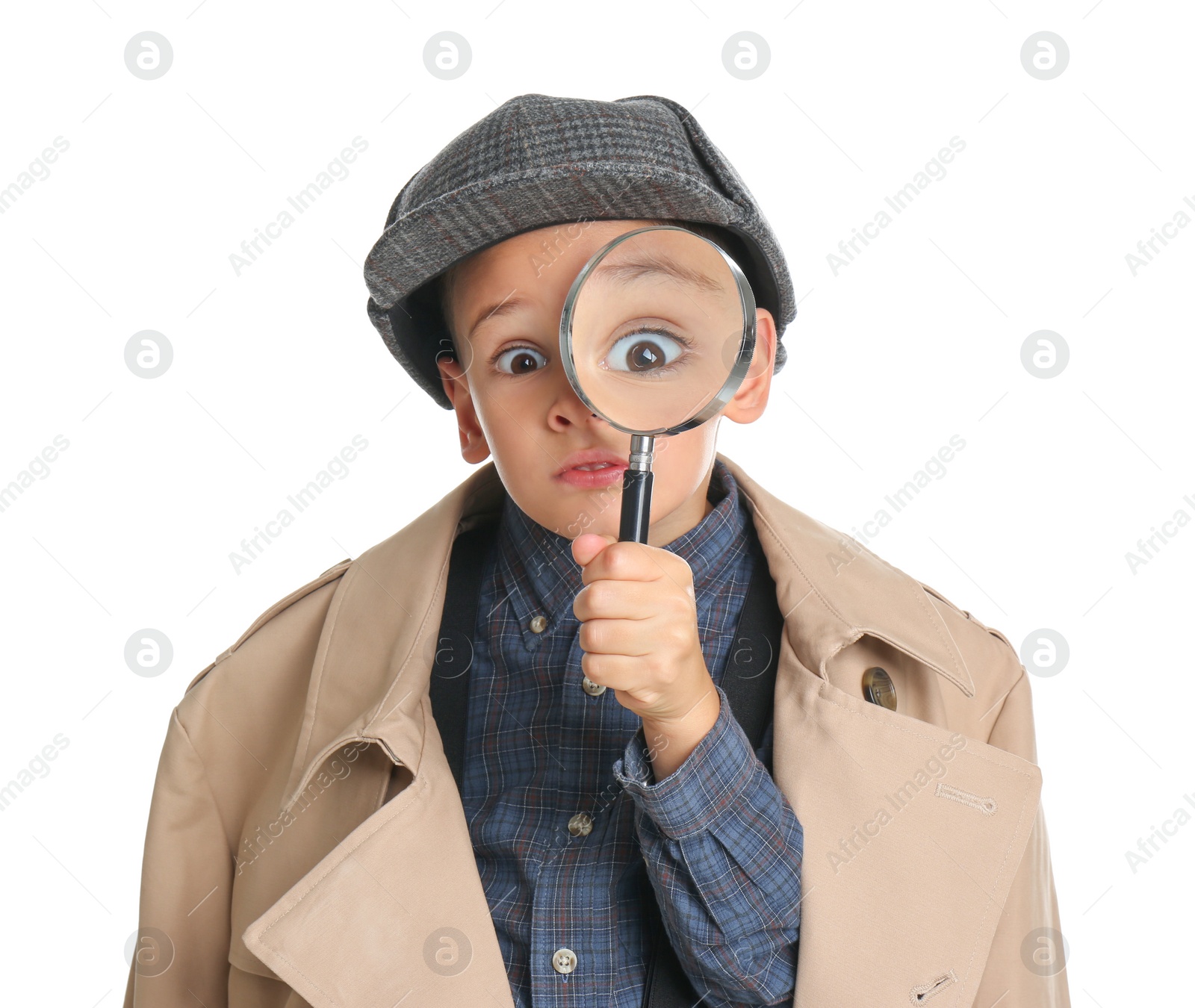 Photo of Little boy with magnifying glass playing detective on white background