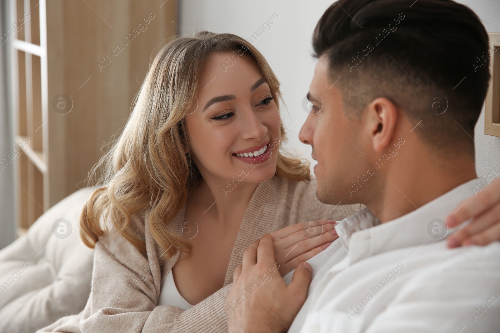 Photo of Lovely couple enjoying time together at home