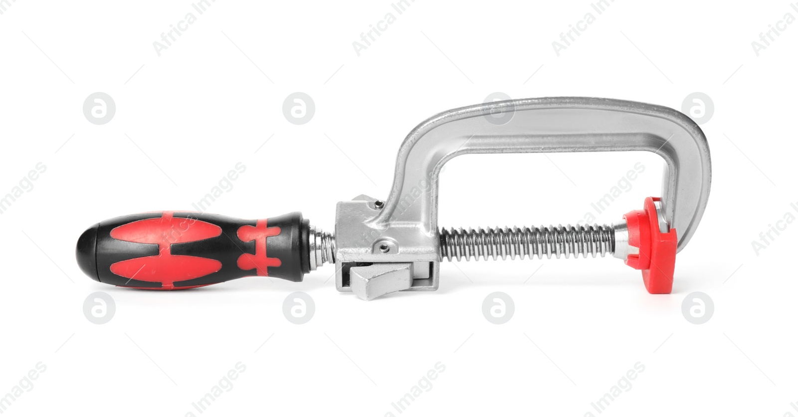 Photo of New clamp isolated on white. Construction tool