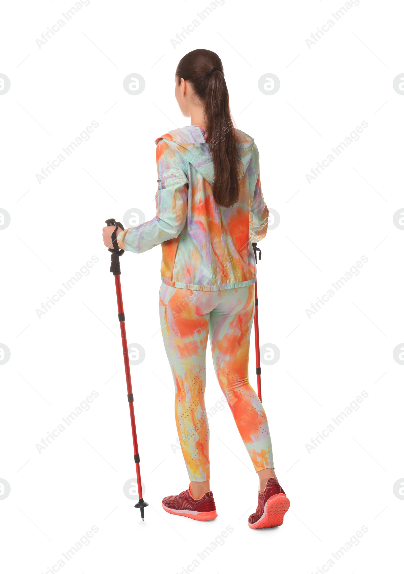 Photo of Young woman practicing Nordic walking with poles isolated on white, back view